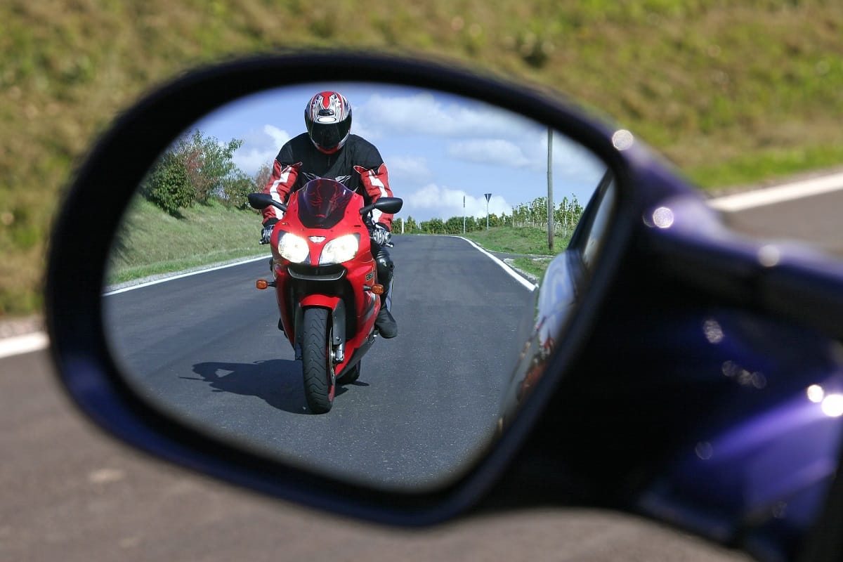 Motorcycle-mirror-road-car.jpg